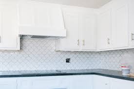 The range hood is available in 5 different wood types and comes unfinished. Week 5 Diy Range Hood Cover Tiling Jenna Kate At Home