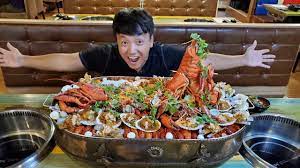 Spicy Lobster Seafood Hotpot Lake 15 Person Seafood Challenge In Singapore Seafood Food Spicy