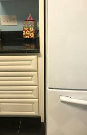 Jessica klewicki glynn example of a transitional kitchen design in miami with white cabinets, yellow backsplash, stainless steel appliances and an island. Why Are My White Cabinets Yellowing Hometalk