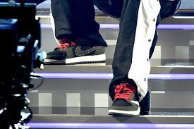 Cactus jack heel embossing, retro nike air tongue tags and mismatched insoles serve as additional branding details. Travis Scott Debuts A Cactus Jack Air Jordan 1 Low At The Grammys Sneaker Freaker