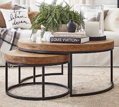 While choosing a coffee table may feel like both an overwhelming and an unsexy task. Malcolm Round Nesting Coffee Tables Pottery Barn