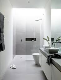 6 White Bathroom Ideas For A Peaceful Vibe Houseminds Grey Bathroom Tiles Minimalist Bathroom Design Modern Bathroom