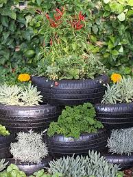 Herbs can also be used to offer vertical interest by growing them in containers held up on posts, or secured onto walls and fences. Herb Garden Designs Windowsunity