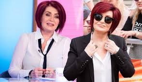 Months after a fourth facelift rendered her unrecognisable, sharon osbourne has after years of colouring her hair dark red, the talk show host has chosen to embrace her natural hair colour, which her stylist calls 100 per cent white. Sharon Osbourne Ditches Her Famous Red Hair For Sleek Grey Do