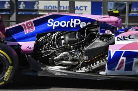 F1 front wings for sale, formula 1 gears, engine covers, wheel nuts and engine tables. Stroll S Racing Point Strips Itself On Track Grand Prix 247