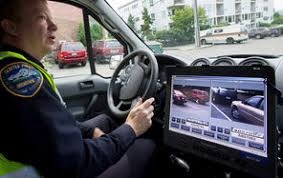 8 3 13 Seattletimes Seattle Police Department S Cregan Newhouse Drives Around Beacon Hill Looking For Stolen Cars And Veh With Images Police License Plate New Technology