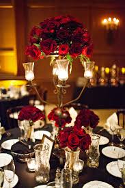 Tall cylindrical vases held a large arrangement of red roses at the top for the centerpieces. Red Rose Wedding Decoration Ideas Novocom Top