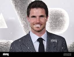 Robbie amell upload hi-res stock photography and images