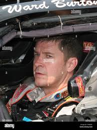 Ward Burton sits in his car waiting for the Nextel Cup Daytona 500 practice  at Daytona International Speedway in Daytona Beach, Florida