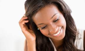 Experienced hairstylists give locks a makeover with a choice of services, such as a silk press from the merchant: Hair Services Beauty Box Natural Hair Salon Groupon