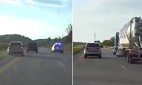 dramatic footage shows cops in ohio helping a driver 20 to stop her runaway suv daily mail online driver 20 to stop her runaway suv