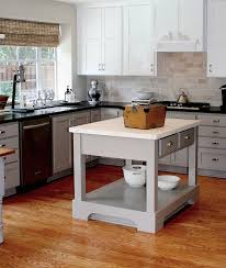 Suzie Cote De Texas Gorgeous Two Tone Kitchen With Creamy White Shaker Top Kitchen Cabinets Benja Top Kitchen Cabinets Kitchen Remodel Kitchen Renovation