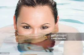 Woman In Swimming Pool High-Res Stock Photo