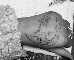 Ariana grande tattoo since ariana grande permanently marked her body for the first time back in 2012 — a tiny heart on her toe to commemorate the making of her debut album yours truly — the pop star's tattoo grande's left hand prominently features another crescent moon, the sun, and stars. Ariana Has A Crescent Moon And Stars On The Back Of Her Left Hand Ariana Grande Popbuzz
