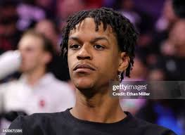 Victor Wembanyama of Metropolitans 92 and Eric Mika of the G League... News  Photo