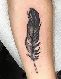 Black is the traditional and common colour of tattoos and it said to represent wisdom. 200 Feather Tattoo Design Ideas In 2021 Feather Tattoo Design Feather Tattoo Feather Tattoos