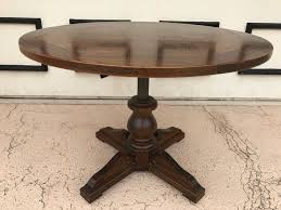 Featuring a tempered glass top, this coffee table with adjustable height is a minimalistic proposition for contemporary interiors. Vintage Parquet Top High Low H Lo Adjustable Pedestal Table