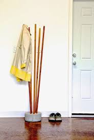 With over 100 different diy coat rack projects to choose from, you will easily find that new perfect. Diy Industrial Concrete And Broomstick Coat Tree Shelterness