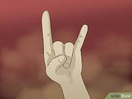 Devil Hand Sign Meaning: From Heavy Metal to the Evil Eye