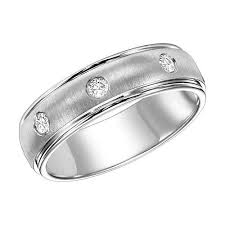 Most wedding bands for both men and women are made with durable materials, like yellow gold, white gold, platinum or tungsten carbide. Goldman 14k White Gold Men S Diamond Wedding Band Roth Jewelers
