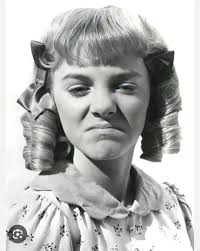 Alison Arngrim as Nellie Oleson who played the little brat