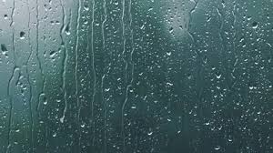 real rain drops sliding on window glass | Stock Video | Pond5