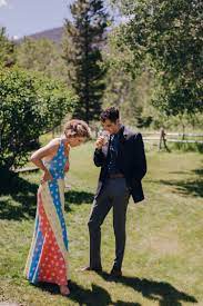 Wear a cocktail dress for a semiformal wedding and go with a long evening dress for a wedding. Wedding Guest Style Inspiration Montana Wedding 70 S Vibe Wedding Guest Dress Dani P Montana Wedding Wedding Guest Style Inspiration Western Style Wedding