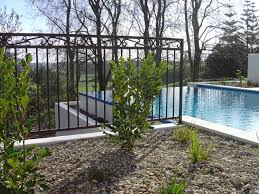 Groll ornamental wrought iron works, iron gates,iron fences & iron railings for your home specializing in wrought iron and aluminum railings, gates and fences we fabricate driveway gates, blacksmith forged railings, custom decorative or contemporary design rails, curved rails for interior or exterior Fences Classic Iron Wrought Iron Gates Fences Balustrades Staircases Lighting Accessories