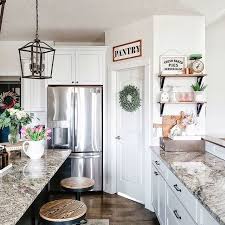 Black And White Farmhouse Kitchen Decor Farmhouse Kitchen Open Shelves White Kitchen Black And White Kitchen Spring Decor Spring Florals In 2020 White Kitchen Open Shelves Spring Decor Kitchen Inspirations
