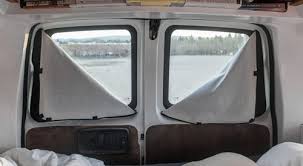 That big piece of black, the the right of the image, framed by the red metal skin of the car should be as see through as the other window in the shot, but it's not! The Complete Guide To Diy Camper Curtains And Window Covers Take The Truck