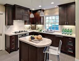 The floor is porcelain tile, counters are black pearl granite and the cabinets are cherry cinnamon stained. Urgent Dark Stain Advice Needed For Cherry Cabinets
