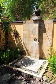 This outdoor shower flows through from an indoor bathroom and is a great idea for busy people who just need a quick shower whilst the industrial concrete flooring and the clever drainage would ensure this space would not get slippery when wet. Epitome Of Luxury 30 Refreshing Outdoor Showers