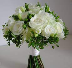 Bohemian chic wedding bouquets are full of whimsical details, wild flowers and feathers. Funny Pictures Gallery White And Green Flowers Wedding Green Flowers Wedding Flowers Green Wedding Flowers White Wedding Flowers Green Wedding Bouquet
