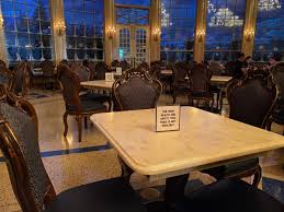 The lack of windows makes the dining rooms dark, especially the west wing room. Review A Socially Distanced Dinner At Be Our Guest Restaurant In The Magic Kingdom Plus An Unexpected Appearance From The Beast Wdw News Today