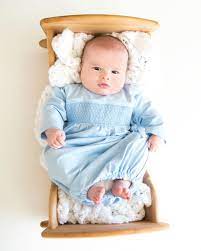 Smocked Baby Gown In Pale Blue Knit Smockingbird
