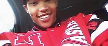 Family members mourn the death of 21-year-old Xavier Bass