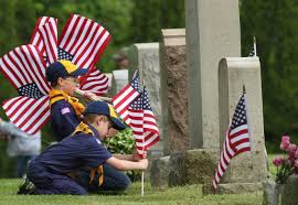 Scouts plant 23,000 flags on graves of ...