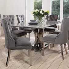 Stunning grey marble dining table with 4 high back silver velvet chairs and 2 lion knocker velvet chairs also console table all matching hasn t been used brand. Remington Grey Velvet Dining Chair With Knocker