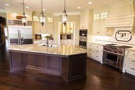 Fabulous Kitchen Design Dark Wood Island With Light Painted Cabinetry Lighted Window Cabinets A Kitchen Countertops Prices Countertops Kitchen Countertops
