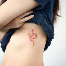 Snake tattoos tend to be quite detailed, so you have to keep them intact. Small Red Snake Tattoo Tattoogrid Net