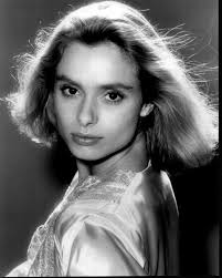 Tempest Storm With Knee Up Looking Over Shoulder Black And White Photo  Print