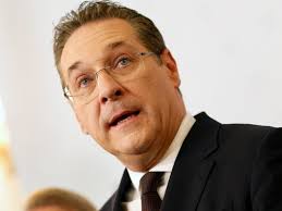 Austrian far-right leader quits over video sting as coalition teeters