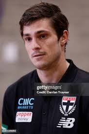 Jimmy Webster and Jade Gresham of the Saints run laps during a St... News  Photo