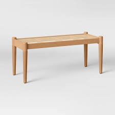 Besides adding additional seating, benches can double as a coffee or side table. Cane And Wood Bench Brown Project 62 Target