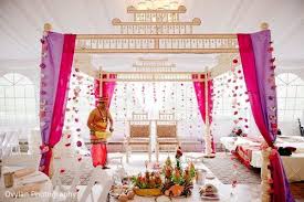 The om mandap decor is an event design and production company that specializes in corporate, wedding, birthday and other social events! Toronto Canada South Indian Fusion Wedding By Ovyian Photography Post 6977 Mandap Indian Wedding Decorations Mandap Design