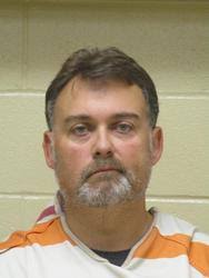 Airline High band director Patrick Neff surrendered to police