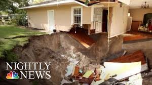 dozens of sinkholes appear across