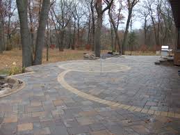 Use a broom to sweep the sand. Why Are Paver Patios Better Than Stamped Concrete Scenic Specialties Landscape Professionals