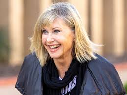 She is known for her role as sandy in grease. Olivia Newton John Posts Video Rumours Of My Death Have Been Greatly Exaggerated Olivia Newton John The Guardian