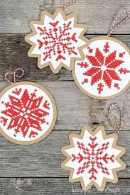 Invite friends over for a cross stitch and movie night for an extra fun make and take. Nordic Cross Stitch Ornaments
